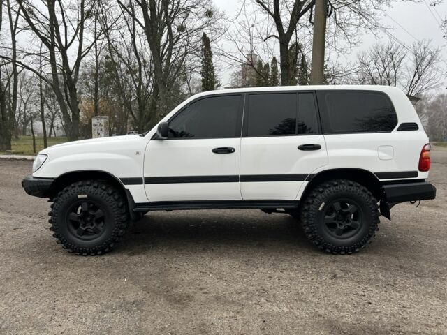 Серый Тойота Ленд Крузер 105, объемом двигателя 4.5 л и пробегом 210 тыс. км за 23000 $, фото 7 на Automoto.ua