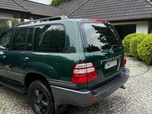 Зеленый Тойота Ленд Крузер 105, объемом двигателя 4.2 л и пробегом 265 тыс. км за 3300 $, фото 2 на Automoto.ua