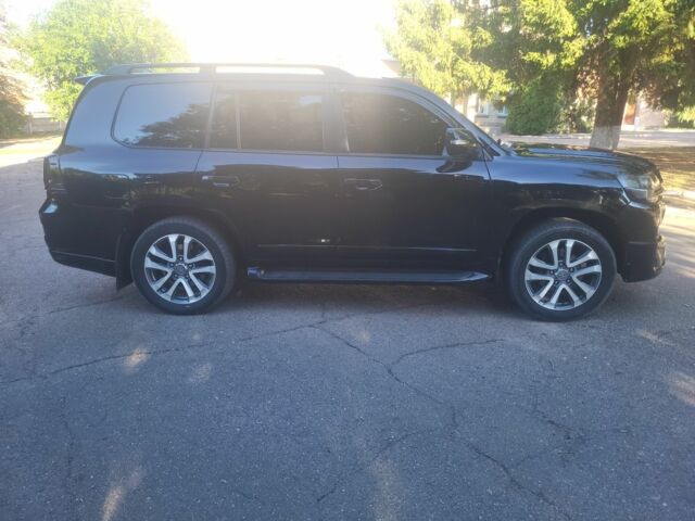 Черный Тойота Ленд Крузер 200, объемом двигателя 4.5 л и пробегом 244 тыс. км за 32000 $, фото 2 на Automoto.ua