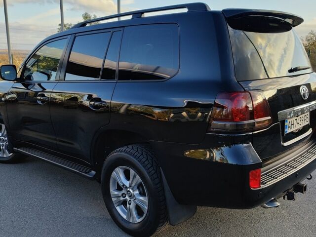 Черный Тойота Ленд Крузер 200, объемом двигателя 4.5 л и пробегом 300 тыс. км за 24000 $, фото 2 на Automoto.ua