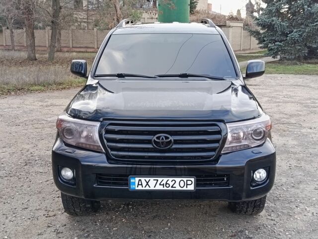 Черный Тойота Ленд Крузер 200, объемом двигателя 4.5 л и пробегом 260 тыс. км за 23500 $, фото 1 на Automoto.ua