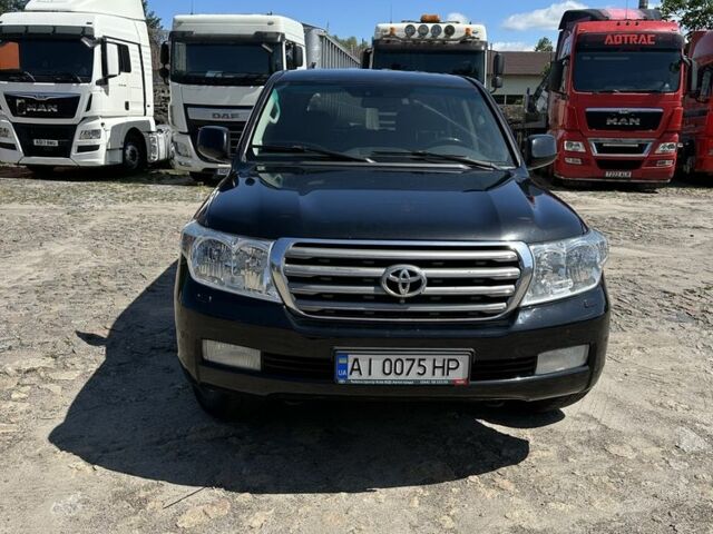 Черный Тойота Ленд Крузер 200, объемом двигателя 4.5 л и пробегом 290 тыс. км за 28000 $, фото 1 на Automoto.ua