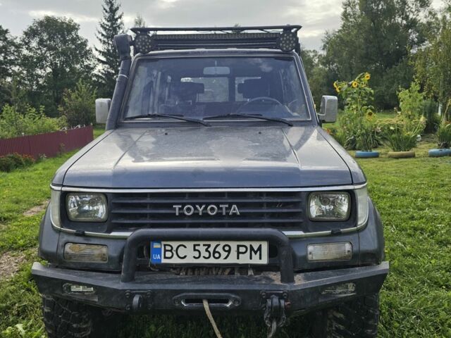 Синий Тойота Ленд Крузер 70, объемом двигателя 3 л и пробегом 205 тыс. км за 16000 $, фото 2 на Automoto.ua
