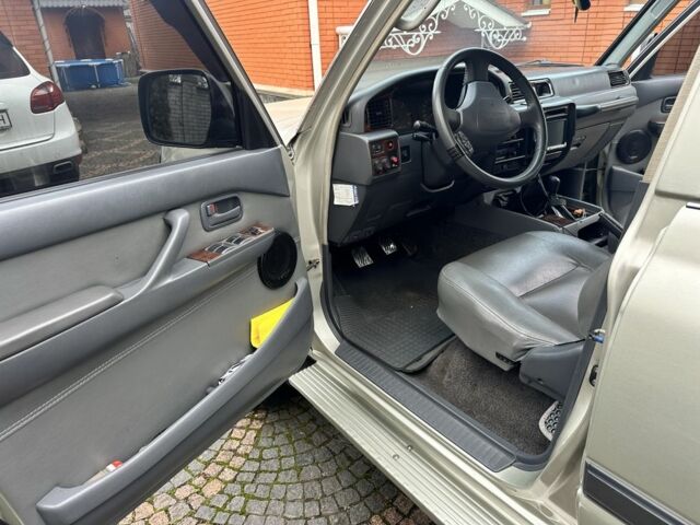 Бежевый Тойота Ленд Крузер 80, объемом двигателя 4.5 л и пробегом 300 тыс. км за 20000 $, фото 5 на Automoto.ua