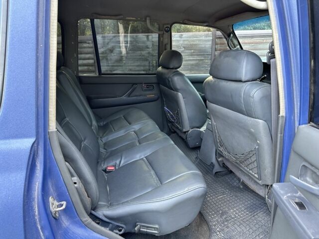 Синий Тойота Ленд Крузер 80, объемом двигателя 4.2 л и пробегом 430 тыс. км за 12000 $, фото 3 на Automoto.ua