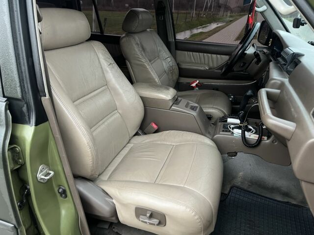 Зеленый Тойота Ленд Крузер 80, объемом двигателя 4.5 л и пробегом 300 тыс. км за 17500 $, фото 16 на Automoto.ua