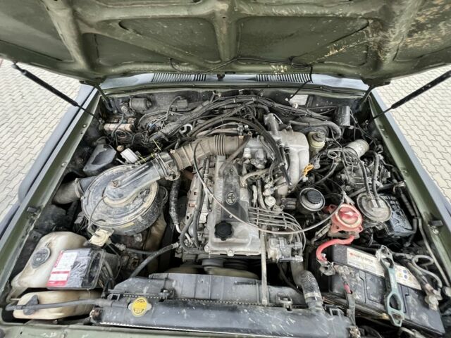 Зеленый Тойота Ленд Крузер 80, объемом двигателя 4.5 л и пробегом 300 тыс. км за 17500 $, фото 11 на Automoto.ua