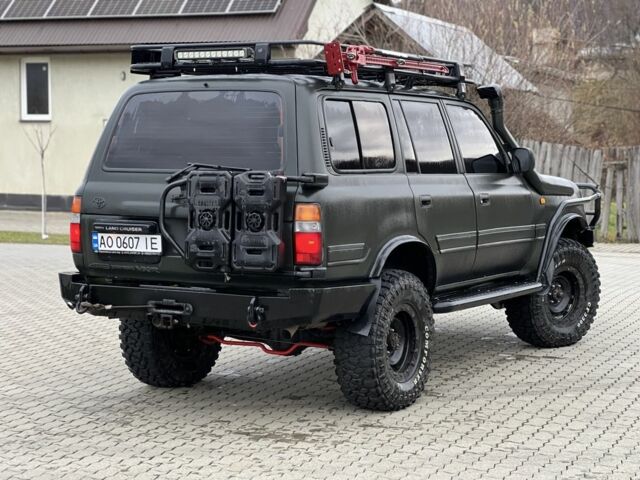 Зеленый Тойота Ленд Крузер 80, объемом двигателя 4.5 л и пробегом 300 тыс. км за 17500 $, фото 3 на Automoto.ua