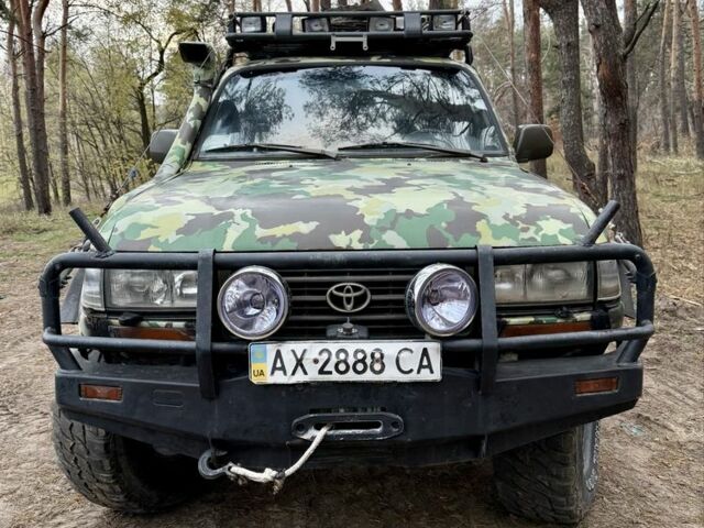 Зеленый Тойота Ленд Крузер 80, объемом двигателя 4.2 л и пробегом 90 тыс. км за 16000 $, фото 7 на Automoto.ua