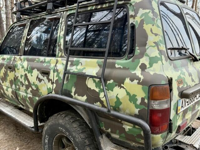 Зеленый Тойота Ленд Крузер 80, объемом двигателя 4.2 л и пробегом 90 тыс. км за 16000 $, фото 5 на Automoto.ua