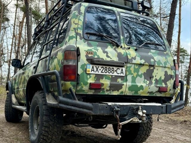 Зеленый Тойота Ленд Крузер 80, объемом двигателя 4.2 л и пробегом 90 тыс. км за 16000 $, фото 1 на Automoto.ua