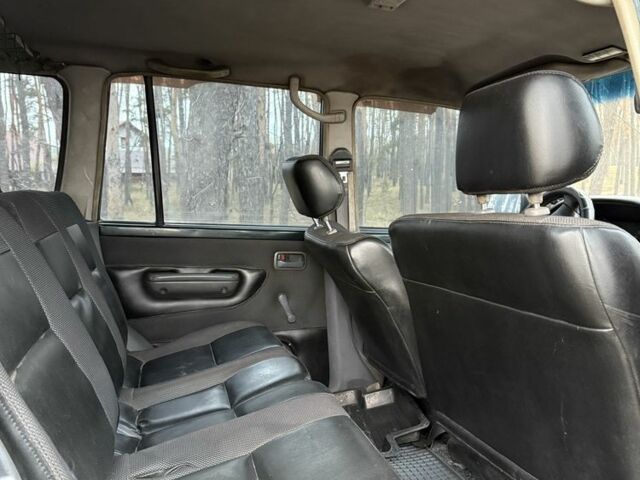 Зеленый Тойота Ленд Крузер 80, объемом двигателя 4.2 л и пробегом 90 тыс. км за 16000 $, фото 11 на Automoto.ua