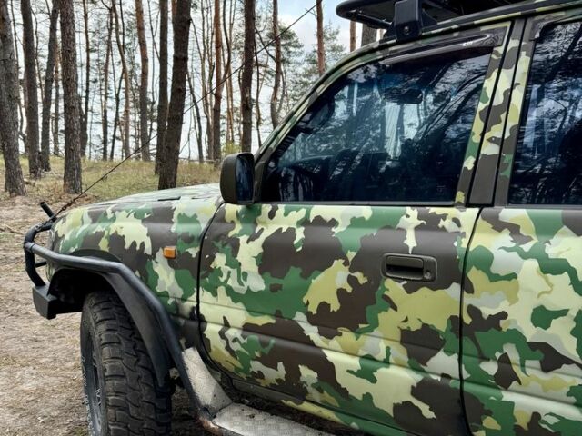 Зеленый Тойота Ленд Крузер 80, объемом двигателя 4.2 л и пробегом 90 тыс. км за 16000 $, фото 6 на Automoto.ua