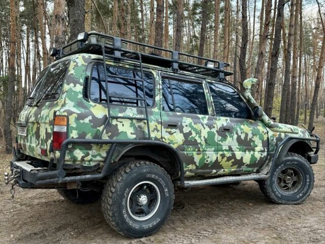 Зеленый Тойота Ленд Крузер 80, объемом двигателя 4.2 л и пробегом 90 тыс. км за 16000 $, фото 21 на Automoto.ua