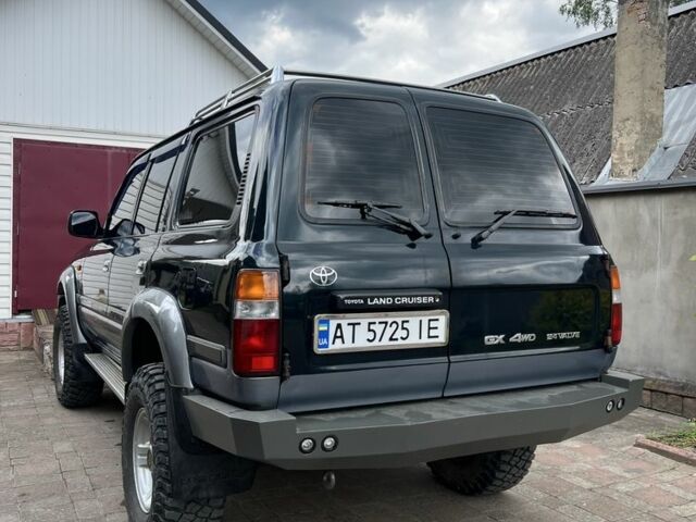 Зеленый Тойота Ленд Крузер 80, объемом двигателя 4.5 л и пробегом 374 тыс. км за 16500 $, фото 5 на Automoto.ua