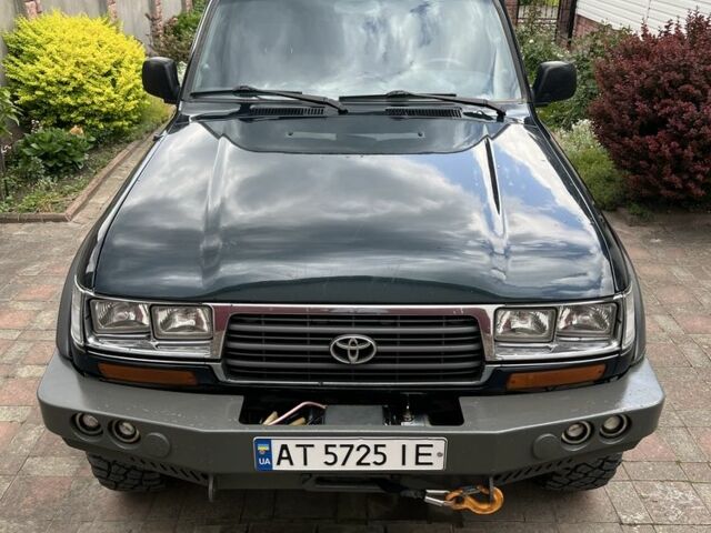 Зеленый Тойота Ленд Крузер 80, объемом двигателя 4.5 л и пробегом 374 тыс. км за 16500 $, фото 2 на Automoto.ua