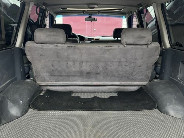 Зеленый Тойота Ленд Крузер 80, объемом двигателя 4.5 л и пробегом 374 тыс. км за 16500 $, фото 7 на Automoto.ua