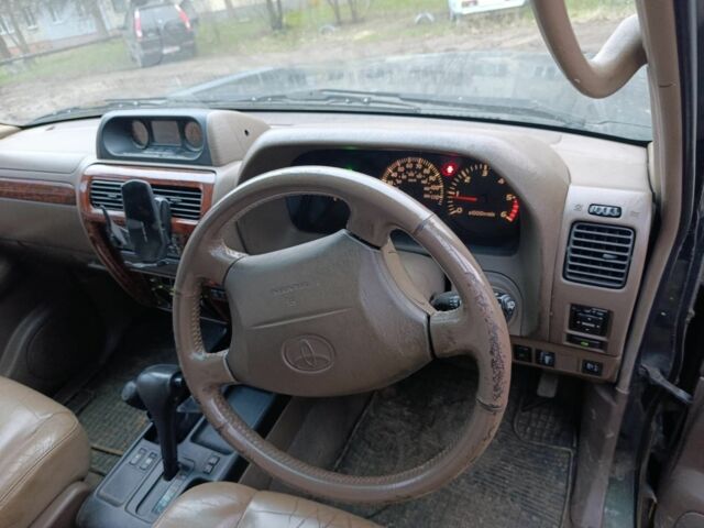 Зелений Тойота Ленд Крузер 80, об'ємом двигуна 3 л та пробігом 300 тис. км за 5000 $, фото 2 на Automoto.ua