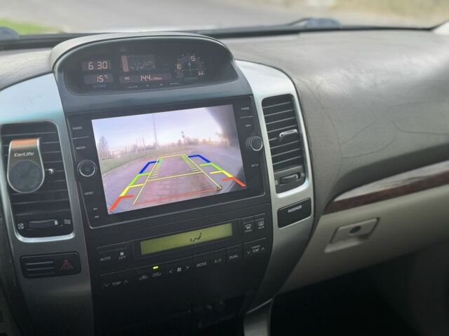 Бежевий Тойота Ленд Крузер Прадо 120, об'ємом двигуна 4 л та пробігом 304 тис. км за 13300 $, фото 19 на Automoto.ua