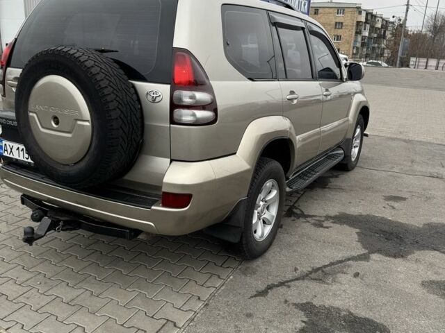 Бежевый Тойота Ленд Крузер Прадо 120, объемом двигателя 3 л и пробегом 200 тыс. км за 18700 $, фото 3 на Automoto.ua