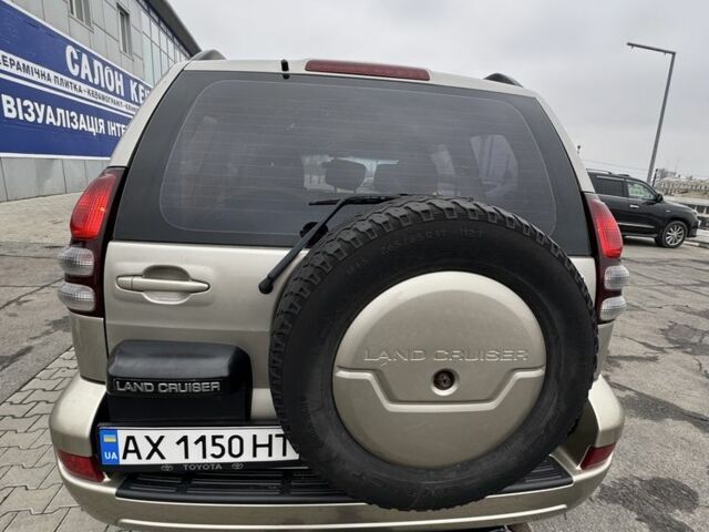 Бежевый Тойота Ленд Крузер Прадо 120, объемом двигателя 3 л и пробегом 200 тыс. км за 18700 $, фото 6 на Automoto.ua