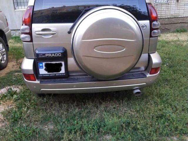 Бежевый Тойота Ленд Крузер Прадо 120, объемом двигателя 4 л и пробегом 330 тыс. км за 13500 $, фото 2 на Automoto.ua