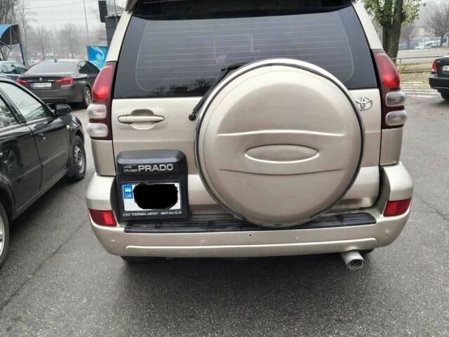 Бежевий Тойота Ленд Крузер Прадо 120, об'ємом двигуна 4 л та пробігом 330 тис. км за 12500 $, фото 1 на Automoto.ua