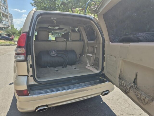 Бежевый Тойота Ленд Крузер Прадо 120, объемом двигателя 4 л и пробегом 315 тыс. км за 11400 $, фото 5 на Automoto.ua