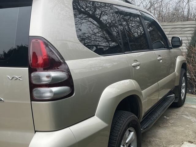 Бежевий Тойота Ленд Крузер Прадо 120, об'ємом двигуна 4 л та пробігом 230 тис. км за 14000 $, фото 1 на Automoto.ua