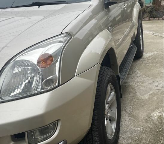 Бежевий Тойота Ленд Крузер Прадо 120, об'ємом двигуна 4 л та пробігом 230 тис. км за 14000 $, фото 3 на Automoto.ua