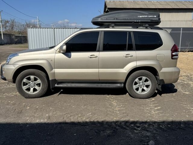 Бежевый Тойота Ленд Крузер Прадо 120, объемом двигателя 4 л и пробегом 350 тыс. км за 13000 $, фото 2 на Automoto.ua