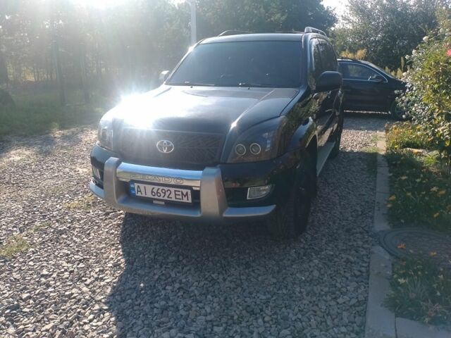 Черный Тойота Ленд Крузер Прадо 120, объемом двигателя 4 л и пробегом 257 тыс. км за 10000 $, фото 1 на Automoto.ua