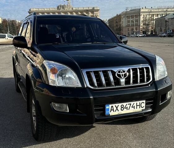 Чорний Тойота Ленд Крузер Прадо 120, об'ємом двигуна 4 л та пробігом 313 тис. км за 14700 $, фото 1 на Automoto.ua