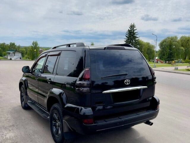 Черный Тойота Ленд Крузер Прадо 120, объемом двигателя 4 л и пробегом 285 тыс. км за 15000 $, фото 1 на Automoto.ua