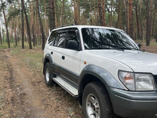 Білий Тойота Ленд Крузер Прадо 90, об'ємом двигуна 2.7 л та пробігом 356 тис. км за 8300 $, фото 1 на Automoto.ua