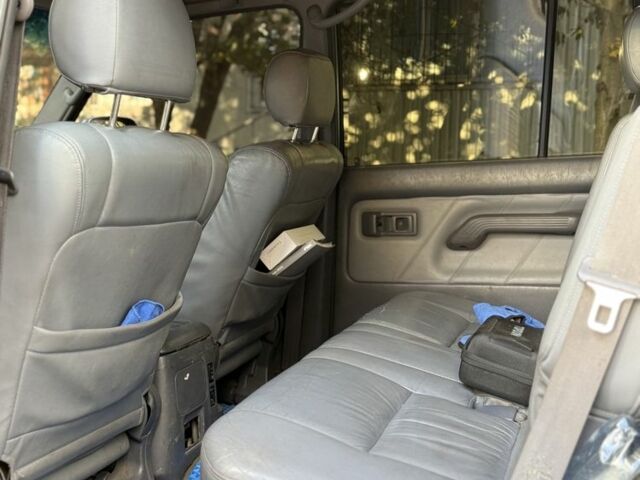 Фиолетовый Тойота Ленд Крузер Прадо 90, объемом двигателя 3 л и пробегом 397 тыс. км за 7000 $, фото 4 на Automoto.ua