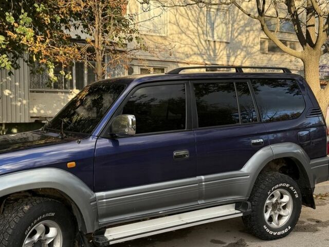 Фиолетовый Тойота Ленд Крузер Прадо 90, объемом двигателя 3 л и пробегом 397 тыс. км за 7000 $, фото 2 на Automoto.ua