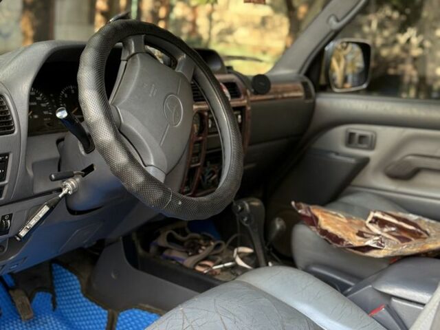 Фиолетовый Тойота Ленд Крузер Прадо 90, объемом двигателя 3 л и пробегом 397 тыс. км за 7000 $, фото 5 на Automoto.ua