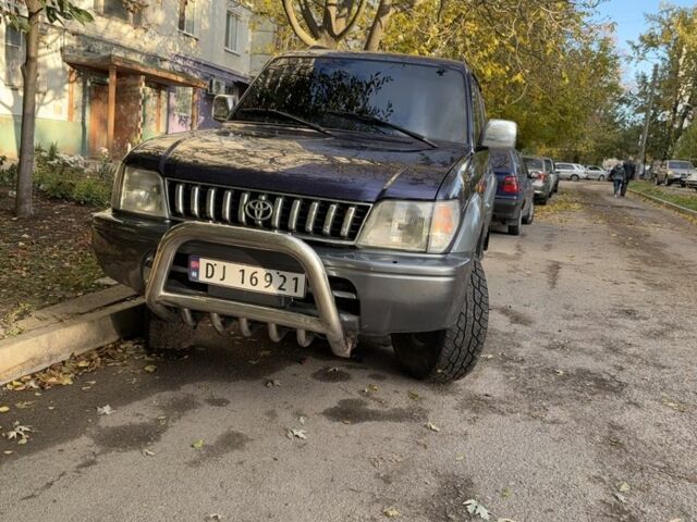 Фиолетовый Тойота Ленд Крузер Прадо 90, объемом двигателя 3 л и пробегом 397 тыс. км за 7000 $, фото 1 на Automoto.ua
