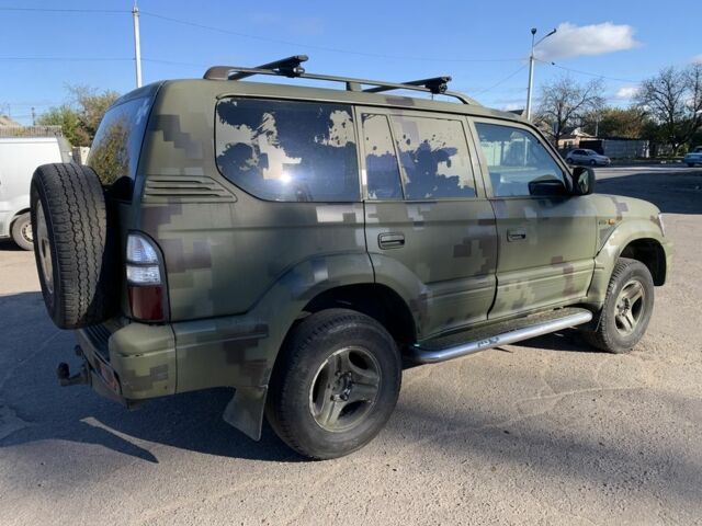 Зелений Тойота Ленд Крузер Прадо 90, об'ємом двигуна 3 л та пробігом 677 тис. км за 10500 $, фото 4 на Automoto.ua