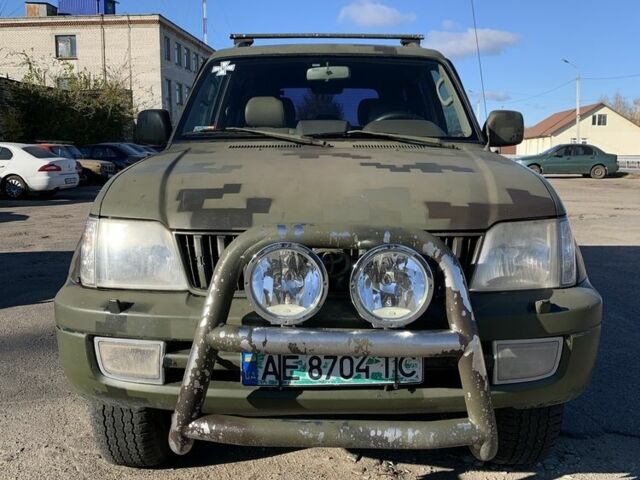 Зелений Тойота Ленд Крузер Прадо 90, об'ємом двигуна 3 л та пробігом 677 тис. км за 10500 $, фото 5 на Automoto.ua