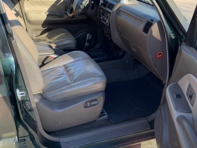 Зелений Тойота Ленд Крузер Прадо 90, об'ємом двигуна 3 л та пробігом 677 тис. км за 10500 $, фото 8 на Automoto.ua