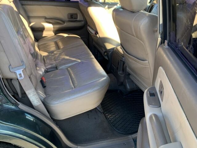 Зелений Тойота Ленд Крузер Прадо 90, об'ємом двигуна 3 л та пробігом 677 тис. км за 10500 $, фото 9 на Automoto.ua