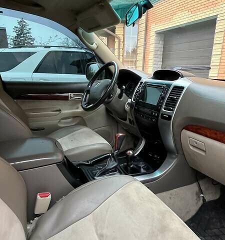 Бежевый Тойота Ленд Крузер Прадо, объемом двигателя 4 л и пробегом 513 тыс. км за 12000 $, фото 10 на Automoto.ua