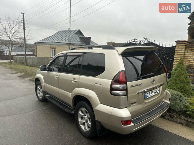 Бежевий Тойота Ленд Крузер Прадо, об'ємом двигуна 4 л та пробігом 322 тис. км за 11700 $, фото 4 на Automoto.ua