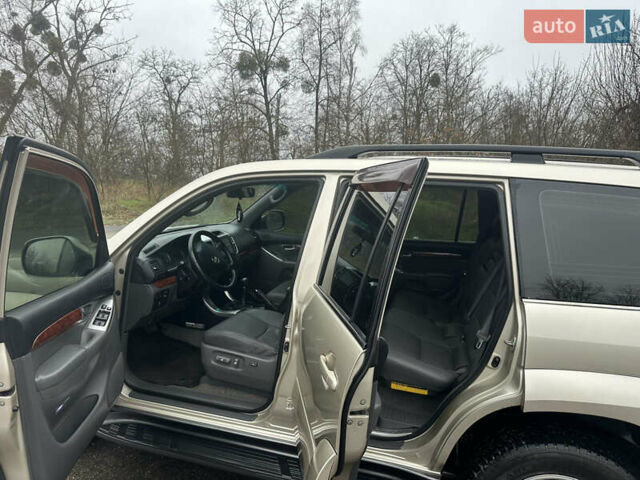 Бежевий Тойота Ленд Крузер Прадо, об'ємом двигуна 4 л та пробігом 322 тис. км за 11700 $, фото 8 на Automoto.ua