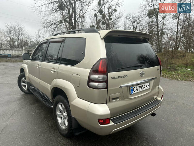 Бежевий Тойота Ленд Крузер Прадо, об'ємом двигуна 4 л та пробігом 322 тис. км за 11700 $, фото 13 на Automoto.ua