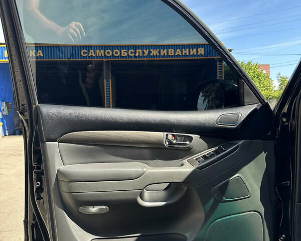 Черный Тойота Ленд Крузер Прадо, объемом двигателя 4 л и пробегом 296 тыс. км за 15900 $, фото 25 на Automoto.ua