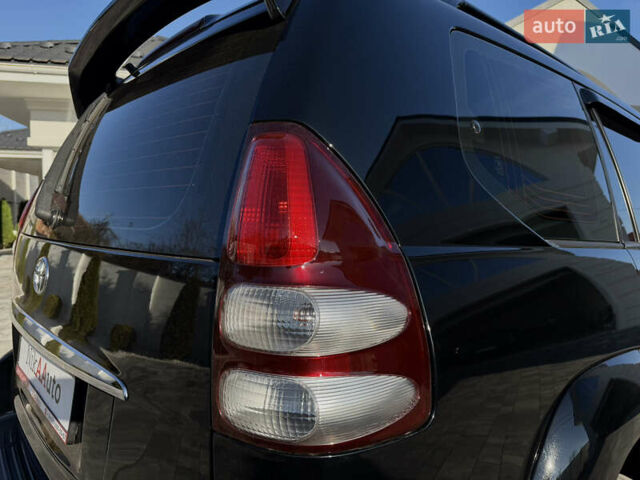 Чорний Тойота Ленд Крузер Прадо, об'ємом двигуна 4 л та пробігом 165 тис. км за 17950 $, фото 18 на Automoto.ua