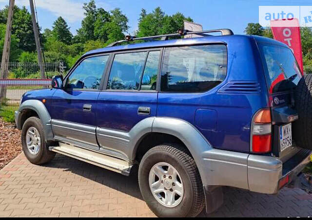 Синий Тойота Ленд Крузер Прадо, объемом двигателя 3 л и пробегом 275 тыс. км за 5300 $, фото 2 на Automoto.ua
